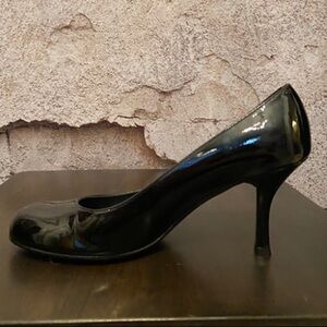 Stuart Weitzman Black Patent Round Toe Pumps